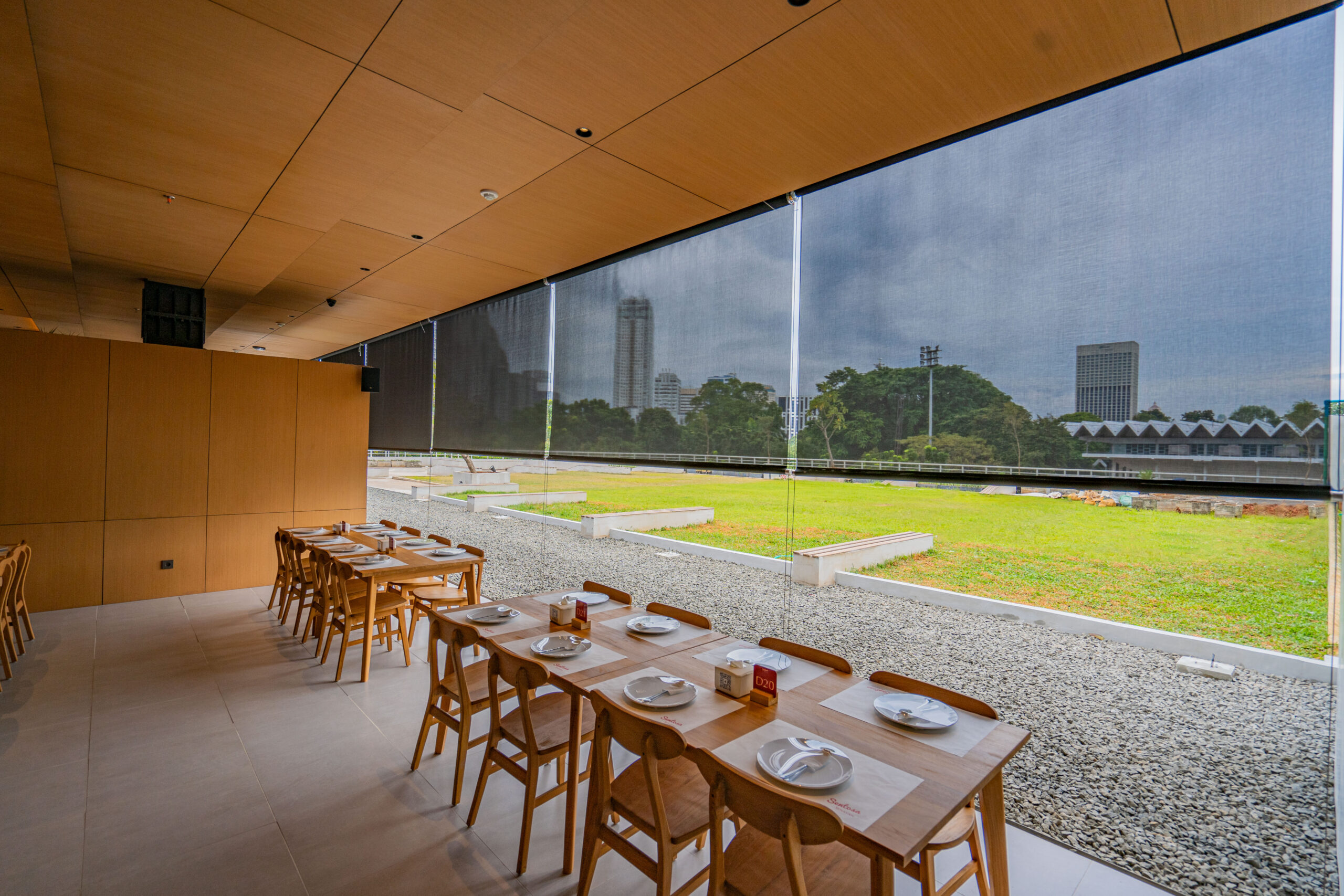 Modern dining room with warm rose blinds
