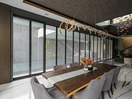 Workplace lounge interior with oak slat wall and leather bench